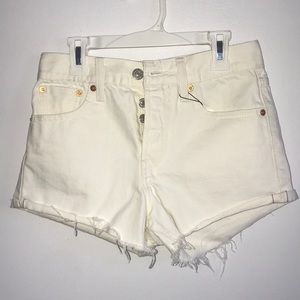 Levi’s High-Waisted Cream Distressed Shorts
